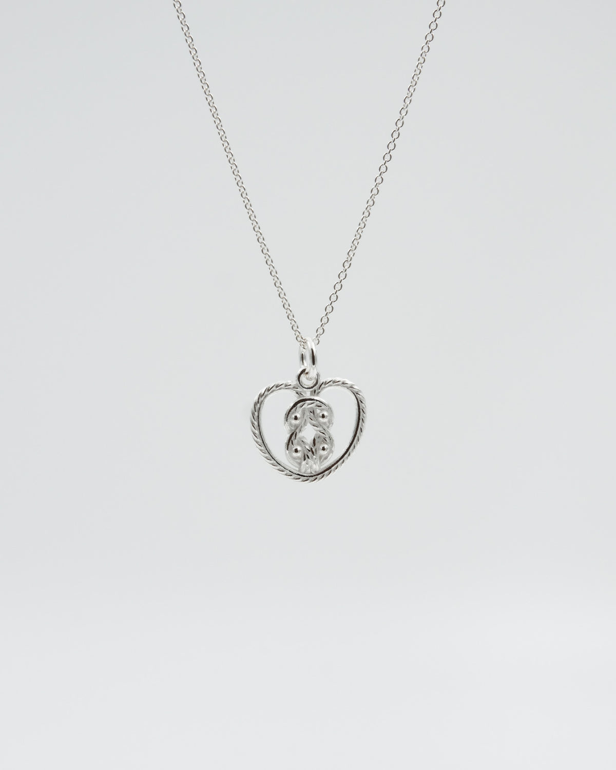 Held Amulet pendant Teljänneito silver