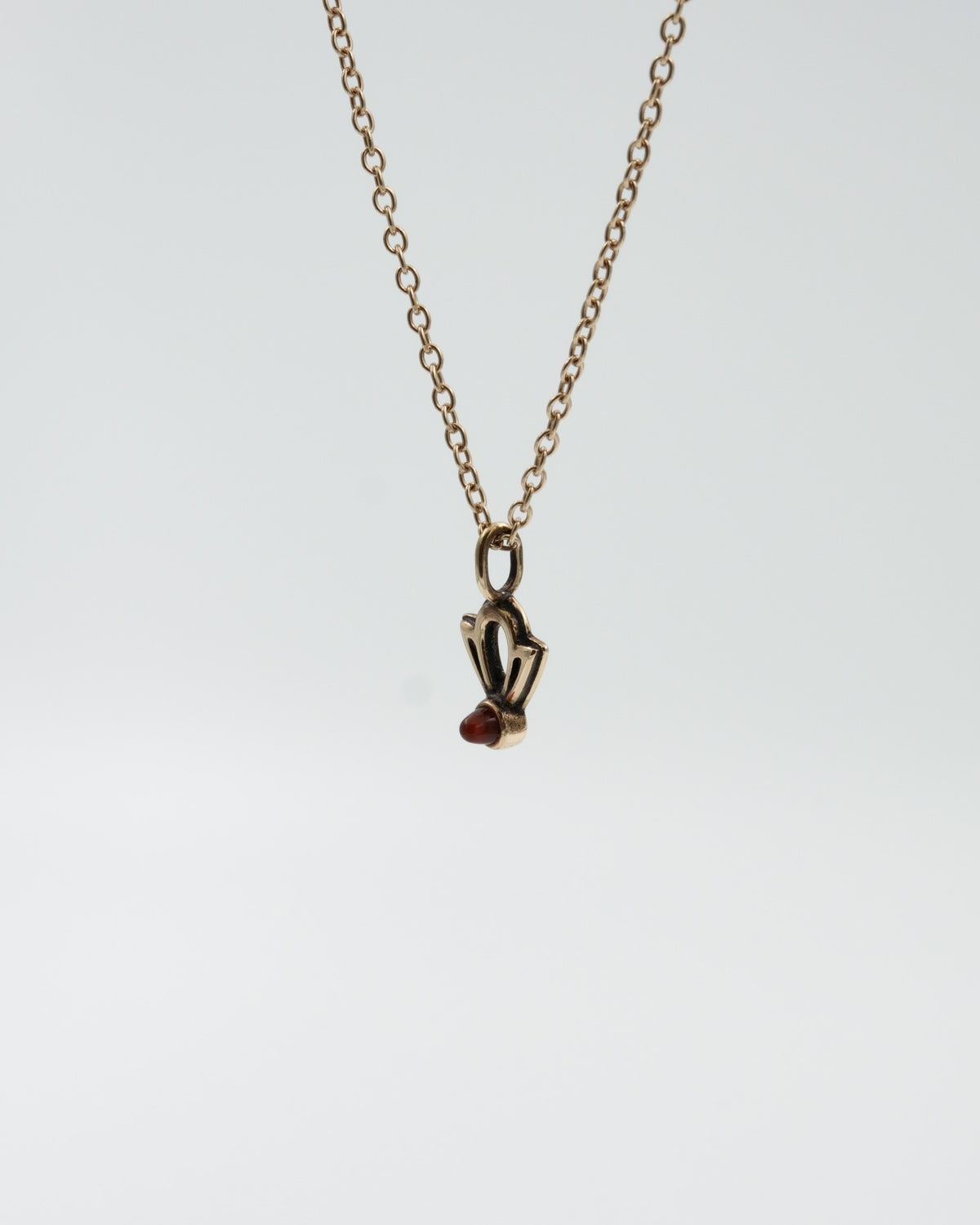 Held Illusion pendant small 45 cm bronze carnelian