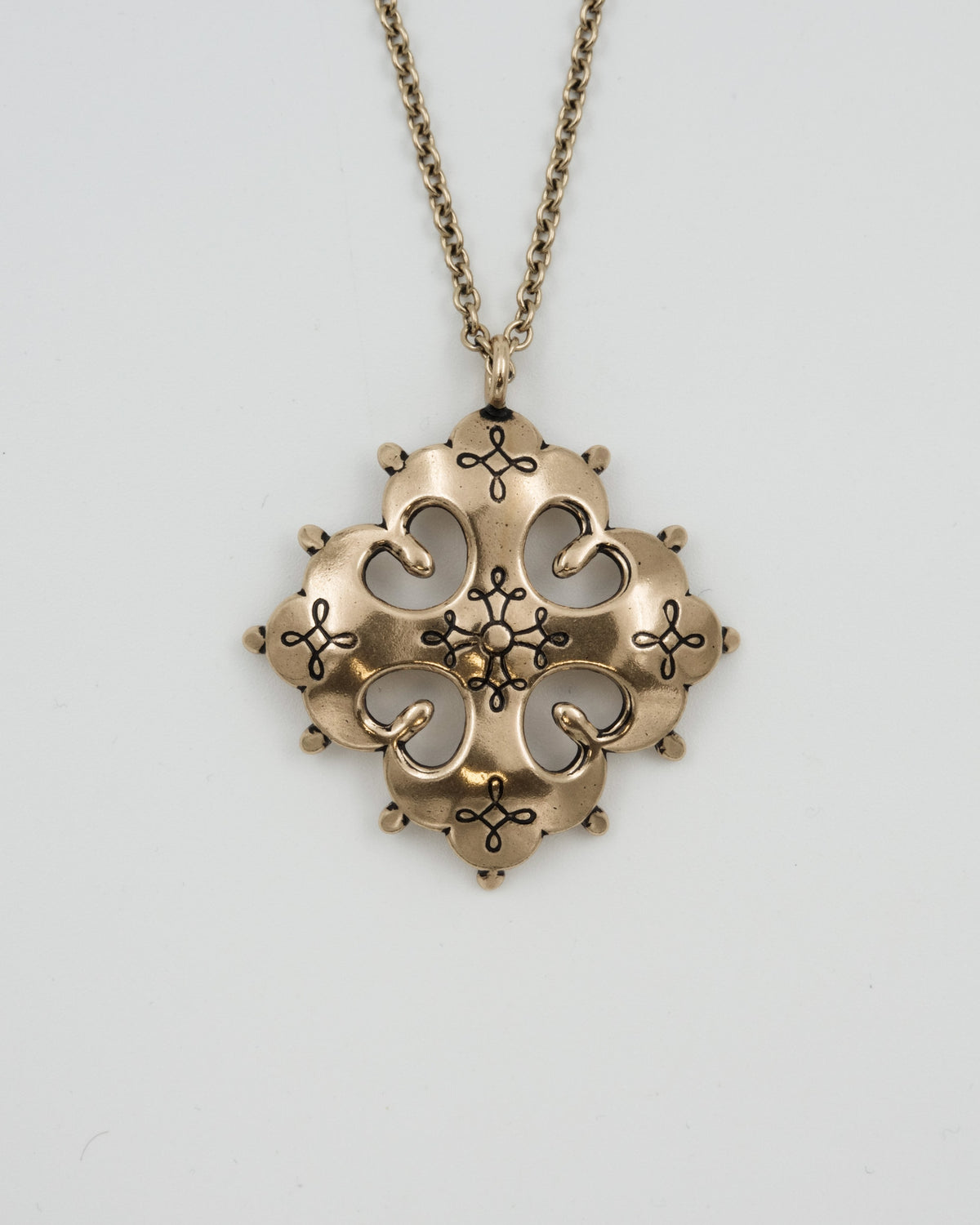Kept border-Karelian cross pendant bronze