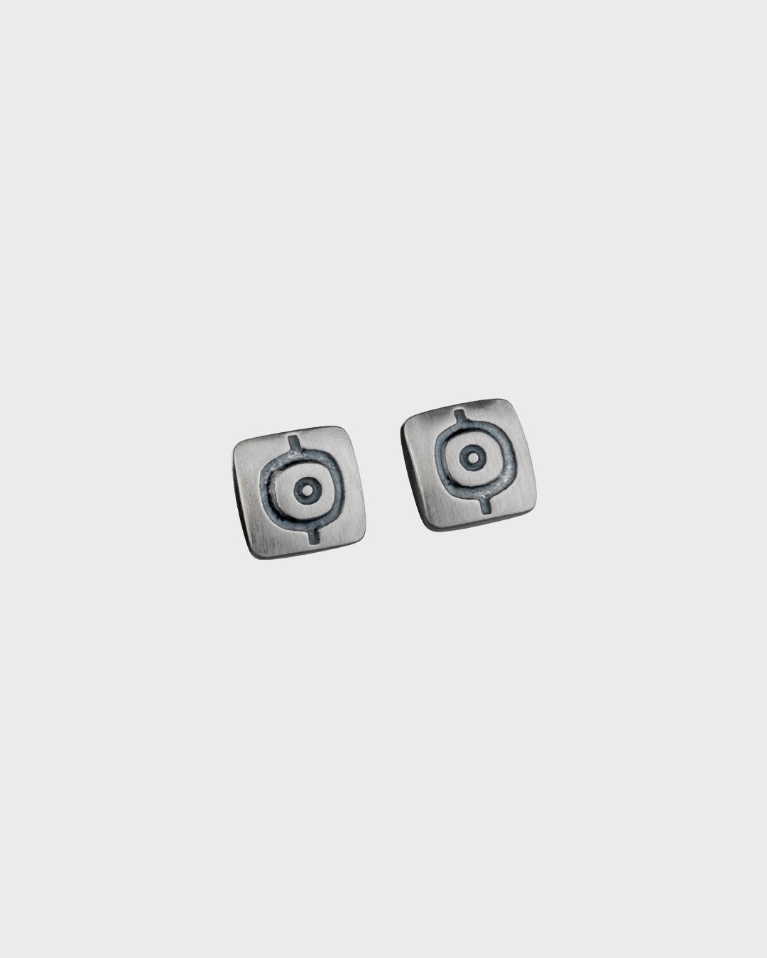 Earth's power earrings